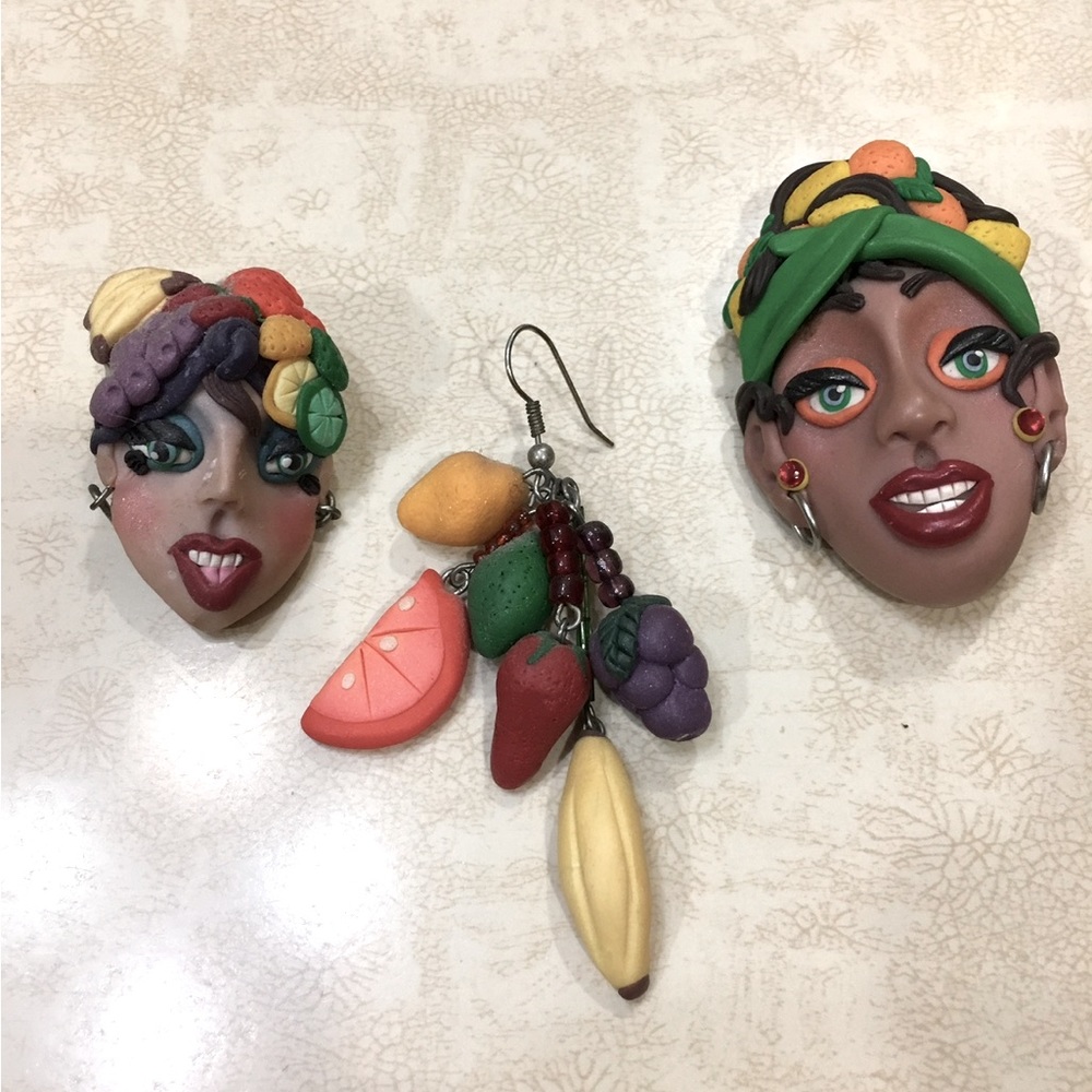Matching earrings and brooch. One earring is dangle the other is post.